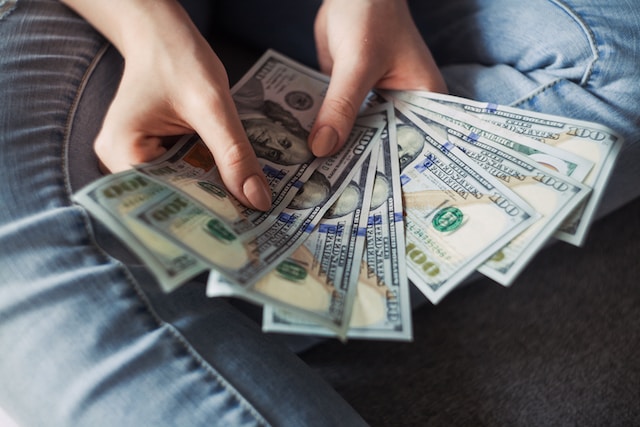 business owner counting her money