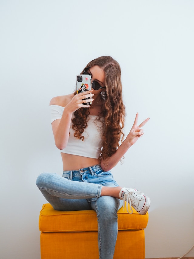 woman taking a selfie for her social media