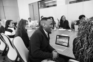 business colleagues laughing during meeting