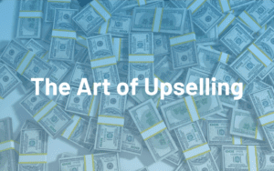 money background with text: The Art of Upselling